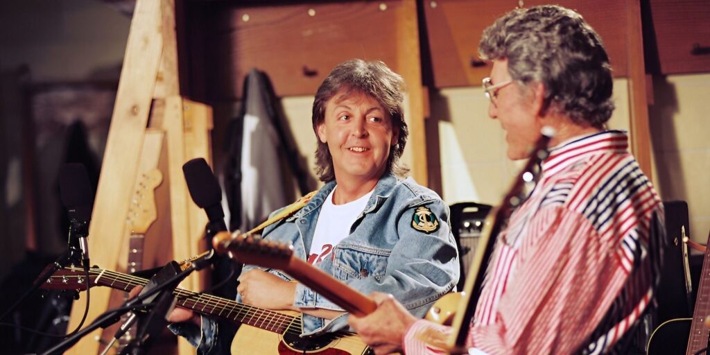 paul-mccartney-and-carl-perkins-playing-together.jpg